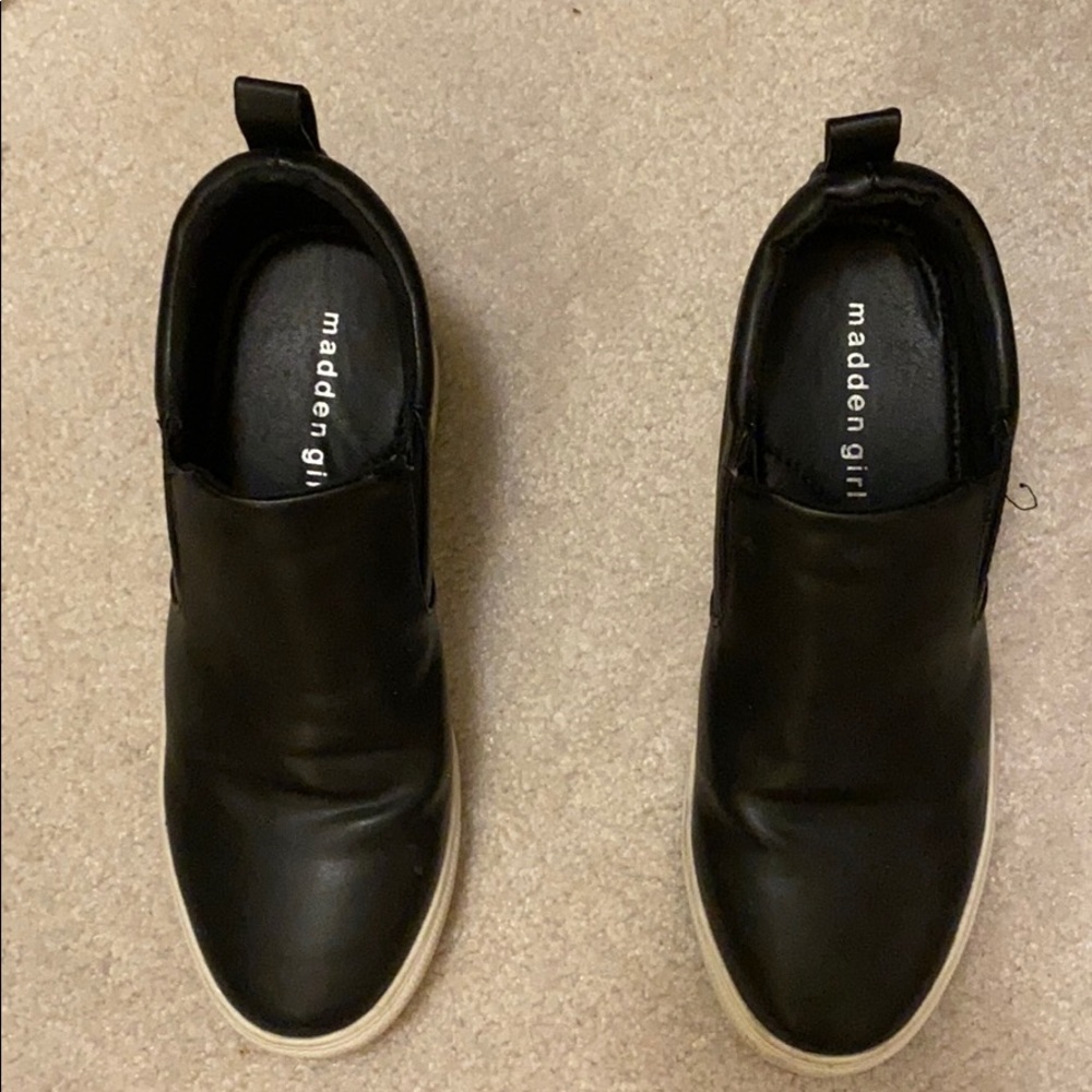 Black slip on heeled shoes